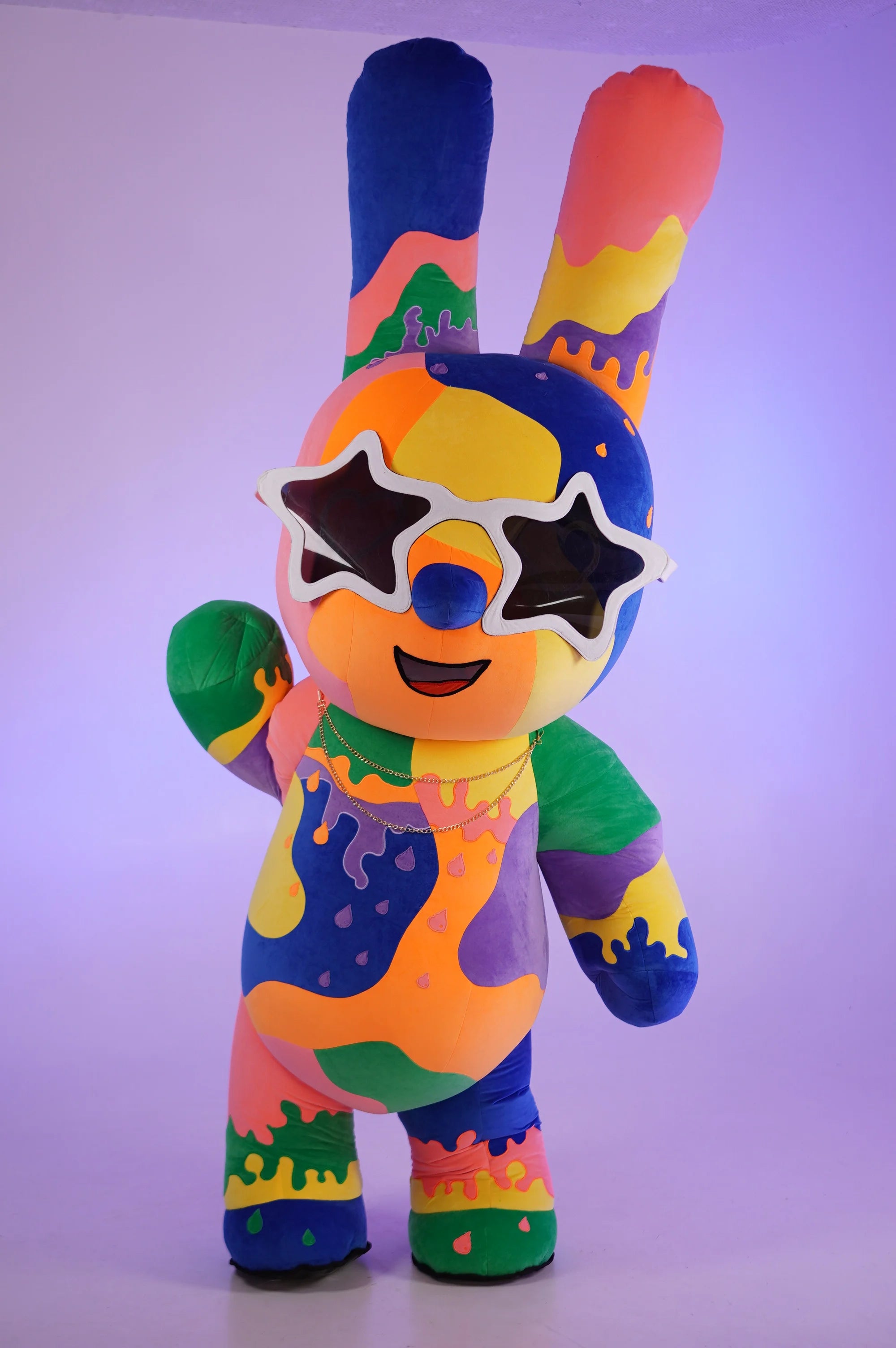 Colorful cartoon character with sunglasses on a light purple background