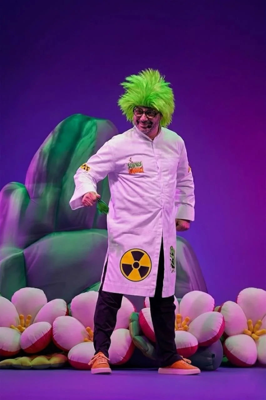 Person in a lab coat with a radioactive symbol on a purple background