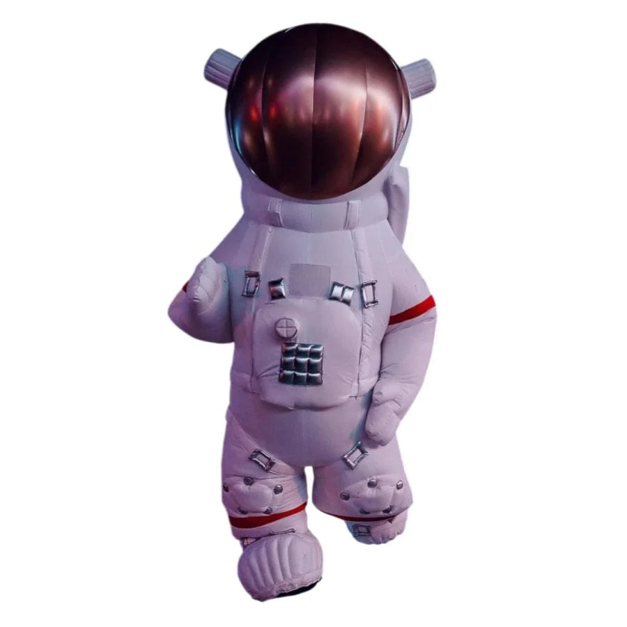 Plush toy resembling an astronaut in a white space suit with red accents on a white background